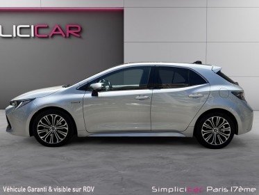 Toyota corolla hybride my20 122h design/toit ouvrant/apple carplay/garantie 12 mois occasion paris 17ème (75)(porte maillot)...