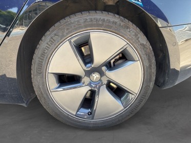 Tesla model 3 autonomie standard plus rwd sièges noirs chauffants régulateur adaptatif caméra de recul garantie tesla...