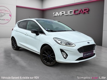 Ford fiesta 1.1 85 ch bvm5 titanium//garantie 12 mois// occasion simplicicar lille  simplicicar simplicibike france