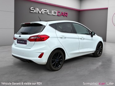 Ford fiesta 1.1 85 ch bvm5 titanium//garantie 12 mois// occasion simplicicar lille  simplicicar simplicibike france
