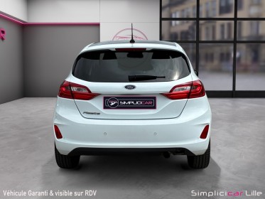Ford fiesta 1.1 85 ch bvm5 titanium//garantie 12 mois// occasion simplicicar lille  simplicicar simplicibike france