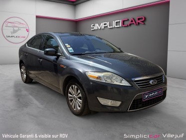 Ford mondeo 1.8 tdci 125 ch titanium 1 er main, radar av/ar, clim auto, garantie 12 mois occasion simplicicar villejuif ...