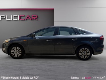 Ford mondeo 1.8 tdci 125 ch titanium 1 er main, radar av/ar, clim auto, garantie 12 mois occasion simplicicar villejuif ...