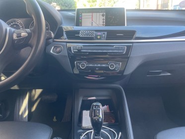 Bmw x1 f48 lci sdrive 18i 140 ch dkg7 business design, volant m, toit ouvrant, caméra de recul, garantie 12 mois occasion...