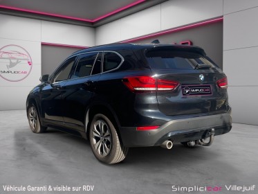 Bmw x1 f48 lci sdrive 18i 140 ch dkg7 business design, volant m, toit ouvrant, caméra de recul, garantie 12 mois occasion...