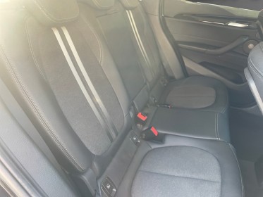 Bmw x1 f48 lci sdrive 18i 140 ch dkg7 business design, volant m, toit ouvrant, caméra de recul, garantie 12 mois occasion...