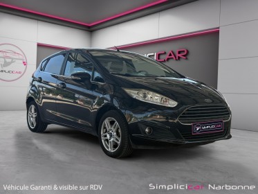 Ford fiesta 1.0 ecoboost 100 ss titanium clim auto radar de recul garantie 12 mois occasion simplicicar narbonne simplicicar...