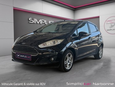 Ford fiesta 1.0 ecoboost 100 ss titanium clim auto radar de recul garantie 12 mois occasion simplicicar narbonne simplicicar...