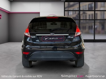 Ford fiesta 1.0 ecoboost 100 ss titanium clim auto radar de recul garantie 12 mois occasion simplicicar narbonne simplicicar...