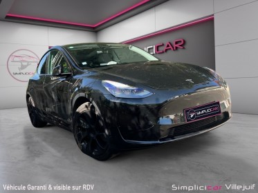 Tesla model y standard rwd garantie 24 mois tesla toit panoramique caméra 360°. occasion simplicicar villejuif  simplicicar...