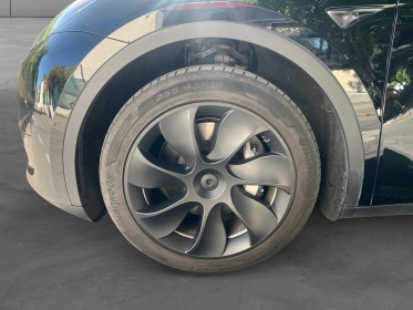 Tesla model y standard rwd garantie 24 mois tesla toit panoramique caméra 360°. occasion simplicicar villejuif  simplicicar...