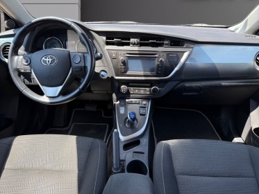 Toyota auris hybride 136h dynamic camera de recul regulateur garantie 12 mois occasion simplicicar dijon simplicicar...