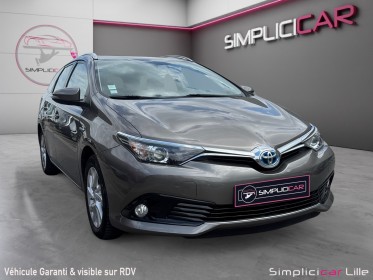 Toyota auris touring sports hybride 136h dynamic occasion simplicicar lille  simplicicar simplicibike france