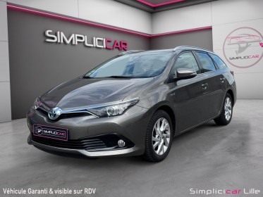 Toyota auris touring sports hybride 136h dynamic occasion simplicicar lille  simplicicar simplicibike france