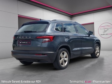Skoda karoq 2.0 tdi 150 ch scr 4x4 dsg7 style occasion simplicicar pontarlier simplicicar simplicibike france