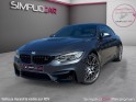 Bmw m4 coupe f82 450 ch pack competition m dkg7 car play / supp. silencieux / toit et diffuseur carbone / suivi entretien...