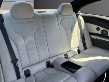 Bmw m4 coupe f82 450 ch pack competition m dkg7 car play / supp. silencieux / toit et diffuseur carbone / suivi entretien...