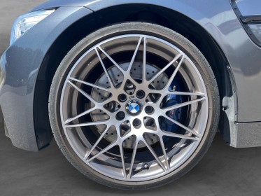 Bmw m4 coupe f82 450 ch pack competition m dkg7 car play / supp. silencieux / toit et diffuseur carbone / suivi entretien...