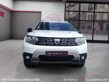 Dacia duster blue dci 115 4x2 15 ans distribution faite occasion simplicicar guadeloupe  simplicicar simplicibike france
