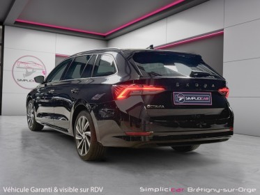 Skoda octavia combi 2.0 tdi 150 ch dsg7 ambition - sièges chauffants - carplay sans fil - garantie 12 mois occasion...