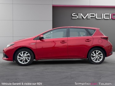Toyota auris hybride 136h dynamic garantie 12 mois occasion simplicicar toulon est simplicicar simplicibike france