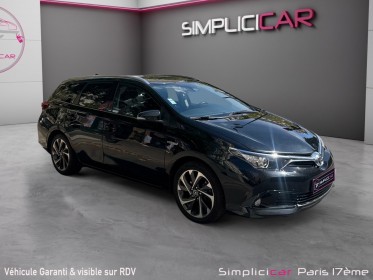 Toyota auris touring sports hybride 136h design / camÉra de recul / garantie 12 mois occasion paris 17ème (75)(porte...