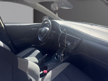 Toyota auris touring sports hybride 136h design / camÉra de recul / garantie 12 mois occasion paris 17ème (75)(porte...
