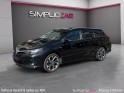 Toyota auris touring sports hybride 136h design / camÉra de recul / garantie 12 mois occasion paris 17ème (75)(porte...