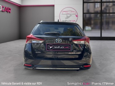 Toyota auris touring sports hybride 136h design / camÉra de recul / garantie 12 mois occasion paris 17ème (75)(porte...