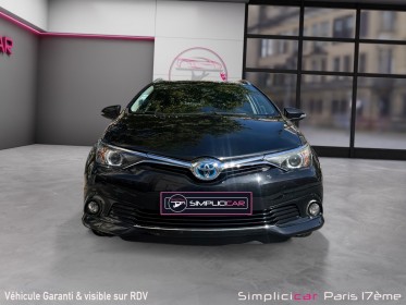 Toyota auris touring sports hybride 136h design / camÉra de recul / garantie 12 mois occasion paris 17ème (75)(porte...