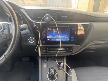 Toyota auris touring sports hybride 136h design / camÉra de recul / garantie 12 mois occasion paris 17ème (75)(porte...