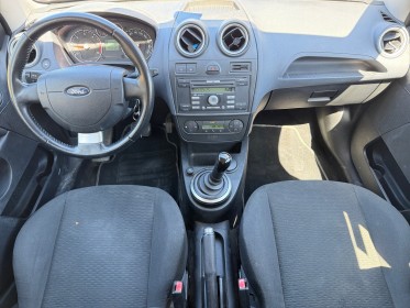 Ford fiesta 1.4 tdci ghia durashift a clim retro rabattable garantie 12 mois occasion simplicicar narbonne simplicicar...