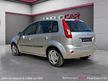 Ford fiesta 1.4 tdci ghia durashift a clim retro rabattable garantie 12 mois occasion simplicicar narbonne simplicicar...