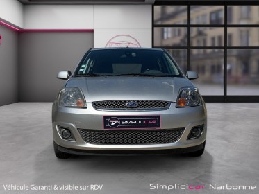 Ford fiesta 1.4 tdci ghia durashift a clim retro rabattable garantie 12 mois occasion simplicicar narbonne simplicicar...