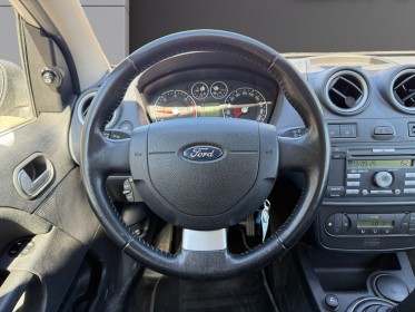 Ford fiesta 1.4 tdci ghia durashift a clim retro rabattable garantie 12 mois occasion simplicicar narbonne simplicicar...
