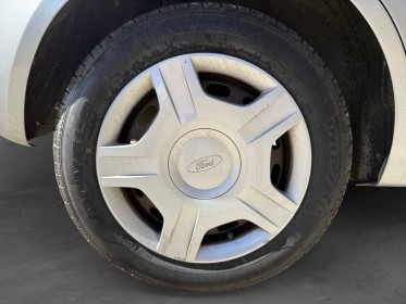 Ford fiesta 1.4 tdci ghia durashift a clim retro rabattable garantie 12 mois occasion simplicicar narbonne simplicicar...