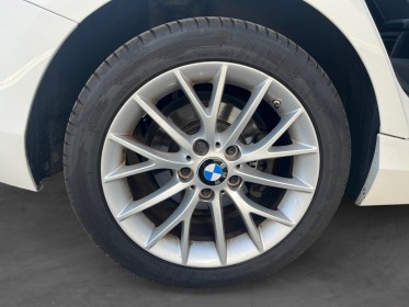 Bmw serie 1 f20 lci 114d 95 ch finition sport - toit ouvrant - camera de recul - sieges sport garantie 12 mois occasion...