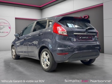 Ford fiesta 1.5 tdci 75 fap titanium clim radar garantie 12 mois occasion simplicicar narbonne simplicicar simplicibike france
