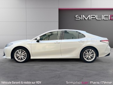 Toyota camry hybride 218ch 2wd design-garantie 12 mois-camÉra de recul-siÈge Électrique occasion paris 17ème (75)(porte...
