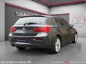 Bmw serie 1 f20 lci2 118i 136 ch bva8 lounge/garantie 12 mois/entretien complet/caméra de recul occasion montreuil (porte de...