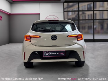 Toyota corolla hybride my22 122h dynamic garantie 12mois occasion simplicicar bretigny-sur-orge simplicicar simplicibike france