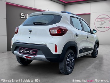 Dacia spring achat intégral business, charge rapide combo ccs, caméra de recul, climatisation. occasion simplicicar rennes...