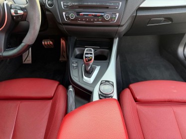Bmw serie 1 f21 bmw serie 1 m135i xdrive 320ch bva8 toit ouvrant cuir rouge harman kardon camÉra de recul garantie 12 mois...