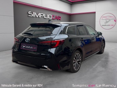 Toyota corolla hybride my22 122h design garantie jusqu'en 2030 carplay occasion simplicicar le raincy simplicicar...