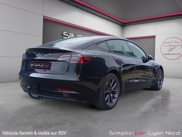 Tesla model 3 autonomie standard plus rwd longue range  auto pilot soundsystem garantie 12 mois occasion simplicicar lyon...