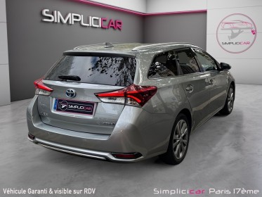 Toyota auris touring sports hybride 136h tendance - siÈges chauffants - camÉra de recul - acc - park assist occasion paris...
