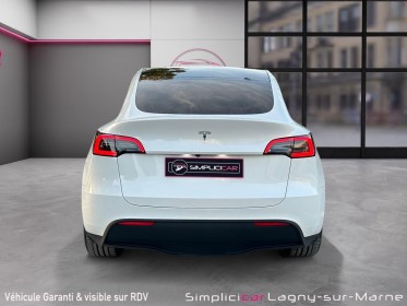 Tesla model y standard rwd - sieges electriques toit panoramique camera 360 occasion simplicicar lagny  simplicicar...