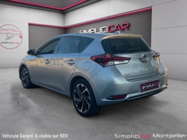 Toyota auris hybride 136h dynamic garantie 12 mois occasion montpellier (34) simplicicar simplicibike france