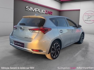 Toyota auris hybride 136h dynamic garantie 12 mois occasion montpellier (34) simplicicar simplicibike france