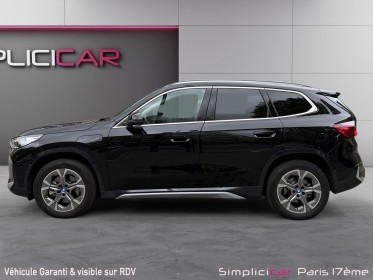 Bmw x1 u11 xdrive 25e 245ch dkg7 xline/entretien bmw/apple carplay/garantie bmw occasion paris 17ème (75)(porte maillot)...